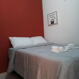 Pousada Caribe Milagrense客房内的一张或多张床位