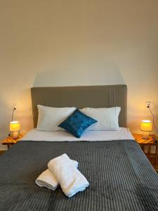 Postel nebo postele na pokoji v ubytování Casa da Juma