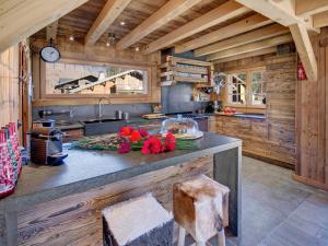a kitchen with a large counter in a cabin at Chalet Morzine, 6 pièces, 13 personnes - FR-1-627-8 in Morzine