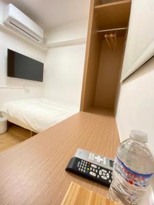 TV a/nebo společenská místnost v ubytování 宏洲旅社HZ Hotel