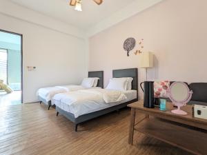 Postel nebo postele na pokoji v ubytování Hoyu''s House B&B + 18 fotografií