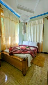 Katil atau katil-katil dalam bilik di Galapagos Homestay