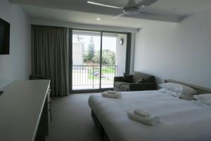 Tathra Hotel & Motel客房内的一张或多张床位