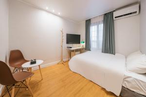 TV a/nebo společenská místnost v ubytování Lofy house