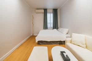 Postel nebo postele na pokoji v ubytování Lofy house + 24 fotografií