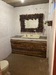 Um banheiro em Cabañas charolet