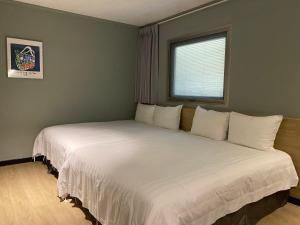 Letto o letti in una camera di Prince Hotel