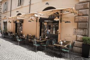 Reštaurácia alebo iné gastronomické zariadenie v ubytovaní Spanish Steps House Vittoria