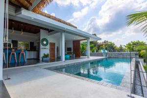 an image of a villa with a swimming pool at Shades of Blue in Srithanu