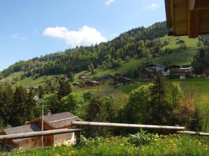 a view of a village in the mountains at Chalet La Clusaz, 5 pièces, 12 personnes - FR-1-437-9 in La Clusaz