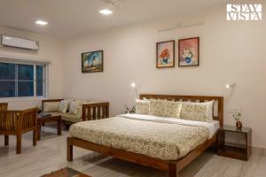 Voodi või voodid majutusasutuse StayVista at Verdant Acres - Guest Favourite toas
