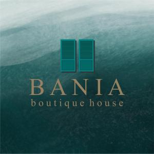 ein Logo für ein Boutique-Haus im Ozean in der Unterkunft Bania Boutique House in Khao Lak