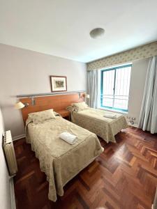 Krevet ili kreveti u jedinici u objektu Amplio y lujoso departamento en la mejor ubicacion de la Ciudad de Mendoza