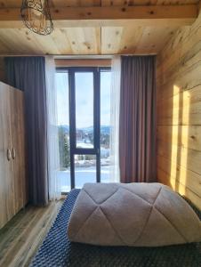 Krevet ili kreveti u jedinici u okviru objekta Cottage SuBree on Goderdzi