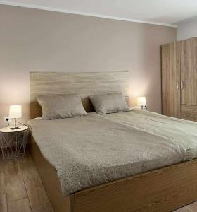 Postel nebo postele na pokoji v ubytování Rooms Osmica- Videm pri Ptuju