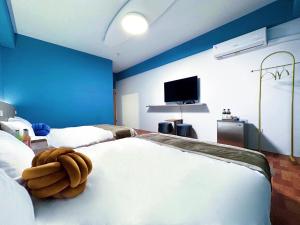 Letto o letti in una camera di NuNc