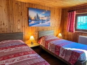 Postel nebo postele na pokoji v ubytování Apartments Les Crouses - Tavern