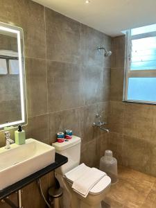 Kúpeľňa v ubytovaní Limelights Premium Serviced Residences