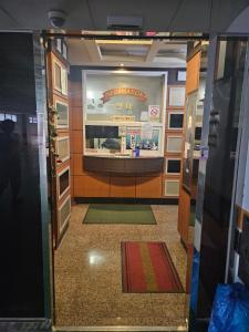 Η κουζίνα ή μικρή κουζίνα στο Blue Motel