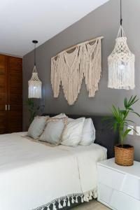 Postel nebo postele na pokoji v ubytování Luz de Luna Tulum Suite III