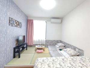 Gallery image of 浅草寺/雷门步行5分钟 晴空塔/上野/隅田川水上巴士站；驛家國際；逍遙1777/二室一卫/2-7人房 xiaoyao1777 in Tokyo