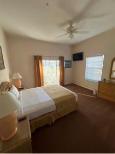מיטה או מיטות בחדר ב-Bahama Bay 116