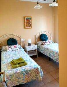 Postel nebo postele na pokoji v ubytování Ático La Tejita Relax + 24 fotografií