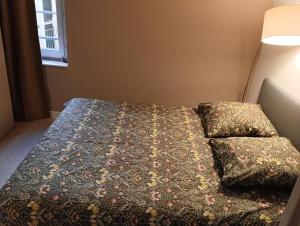 Ένα ή περισσότερα κρεβάτια σε δωμάτιο στο Appartement Cosy Plein Centre Ville