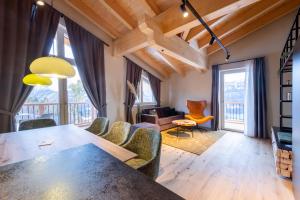 Posezení v ubytování Höflehner Premium Gumpen Lodge