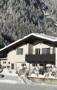 Nespecifikovaný výhled na hory nebo výhled na hory při pohledu z apartmánu