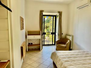 Postel nebo postele na pokoji v ubytování B&B Dumbolo