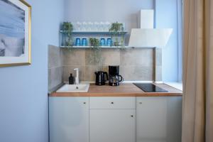 Magheru Boulevard Cozy Studios - Where Less is More