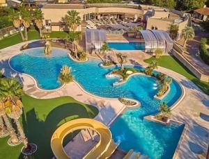 an aerial view of a resort with a water park at LES DUNES - TORREILLES - Chez Cassandre et Nico in Torreilles