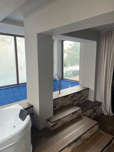 KENT hotel & Restaurant KENT beach客房内的一张或多张床位
