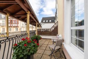 Μπαλκόνι ή βεράντα στο Apartamenty przy Plaży - Promenada Mielno by Noclegi Renters