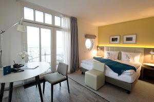 Postel nebo postele na pokoji v ubytování Hotel AM MEER & Spa + 37 fotografií