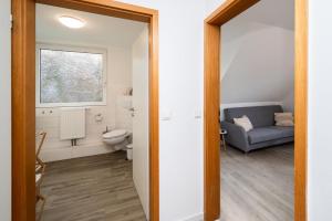 Koupelna v ubytování Perlebüdchen + 16 fotografií