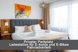 Posteľ alebo postele v izbe v ubytovaní Pension Laubenhof