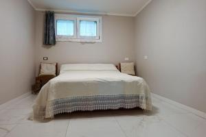 Giường trong phòng chung tại Piazzola holiday home * * * * *