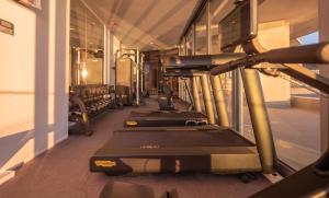 a row of exercise bikes in a gym at Sea Star Budva in Budva