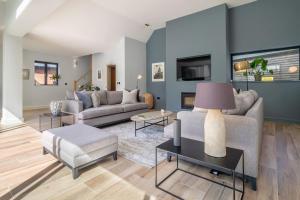 a living room with a couch and a table at Court House, Aldeburgh in Aldeburgh