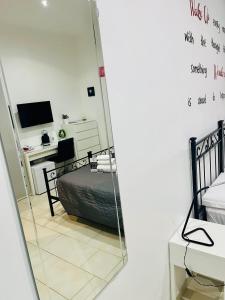 A bed or beds in a room at ImeraRooms