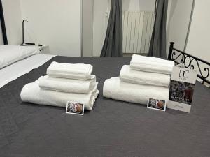 A bed or beds in a room at ImeraRooms