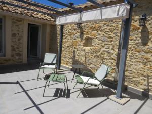 Patio nebo venkovní prostory v ubytování Maison d'hôtes La Bignone