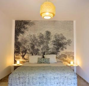 Postel nebo postele na pokoji v ubytování Maison d'hôtes La Bignone