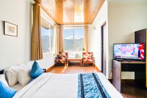 Μια τηλεόραση ή/και κέντρο ψυχαγωγίας στο Hotel Blue Poppy