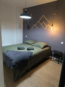 Łóżko lub łóżka w pokoju w obiekcie Lodge Loupau Maga
