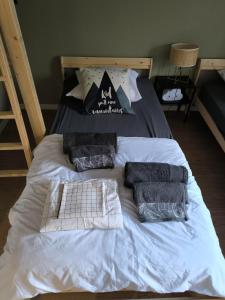 Łóżko lub łóżka w pokoju w obiekcie Lodge Loupau Maga
