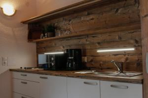 Kuchyň nebo kuchyňský kout v ubytování Hotel Tia Apart