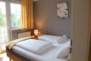 Postel nebo postele na pokoji v ubytování Villa Florl